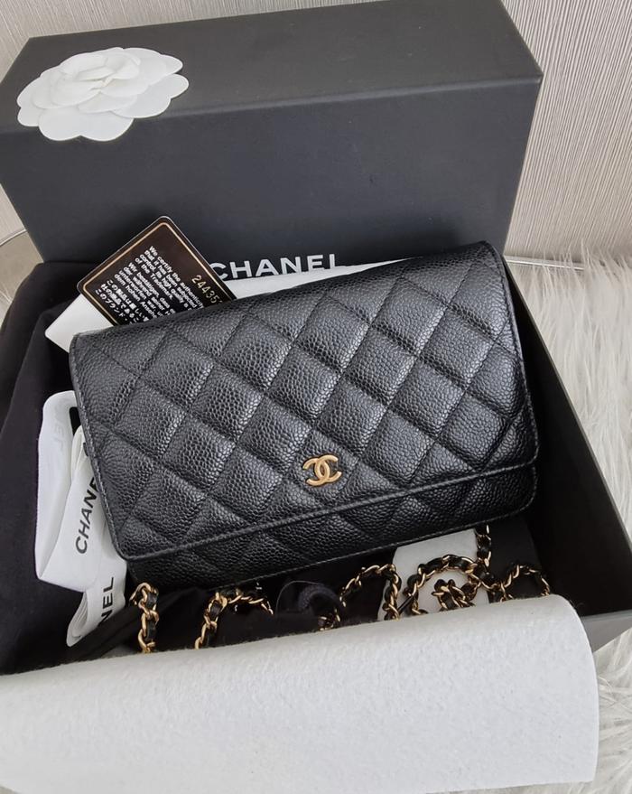 Preloved Chanel Woc black cav ghw seri 24
