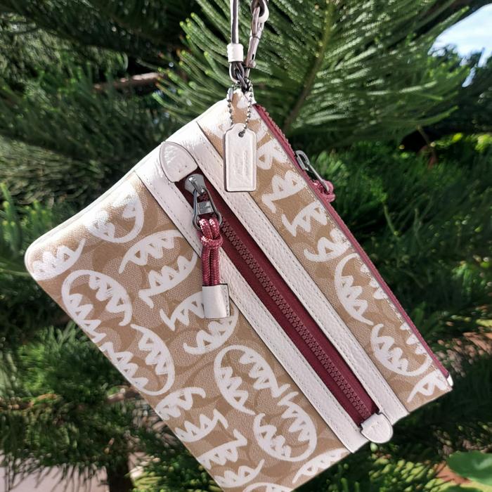 pouch coach signature canvas with rexy by guang yu