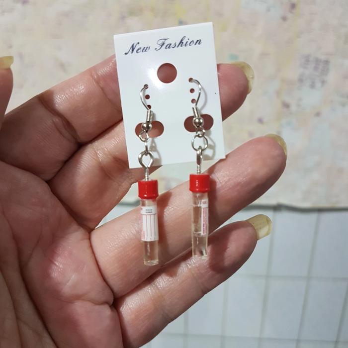 Anting miniatur Transport Medium Rapid Test