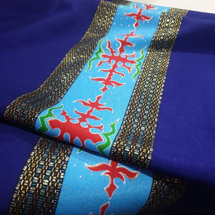 kain batik khas ambon ungu tua