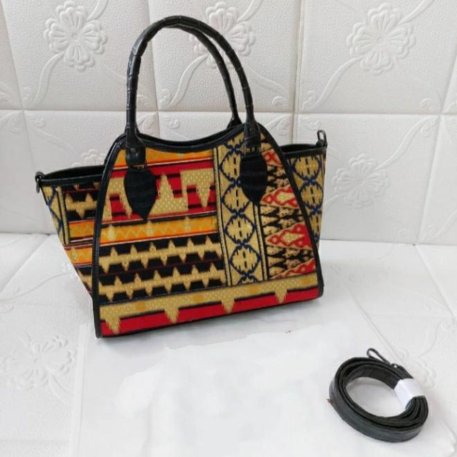 tas jinjing tapis