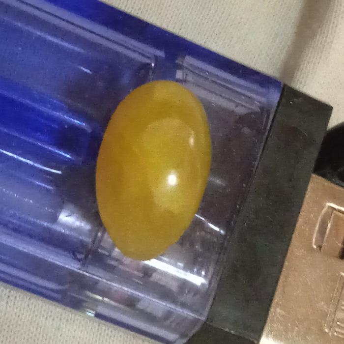 batu mustika merak kuning telur merak