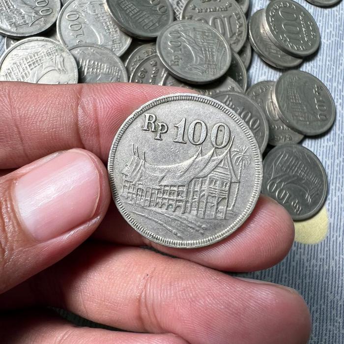 uang koin 100