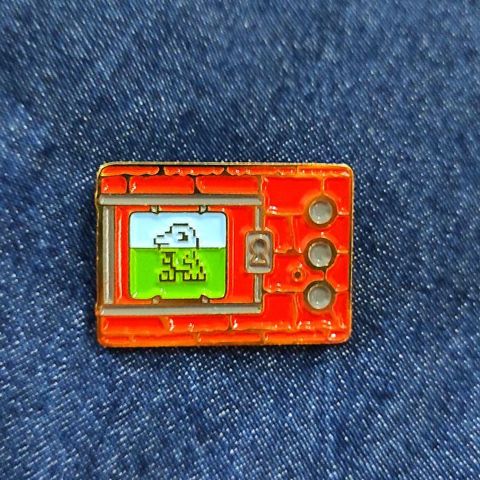 Digimon enamel pin Tamagotchi merah bata