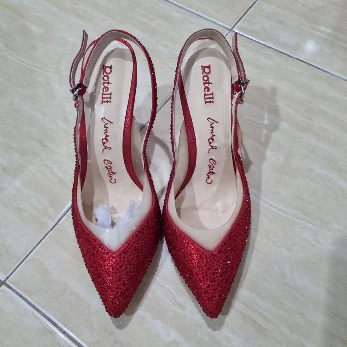 sepatu heels rotelli