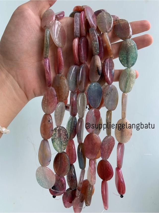 batu Penden simba oval rainbow onyx serat 2 x 4 cm soft kuarsa warna