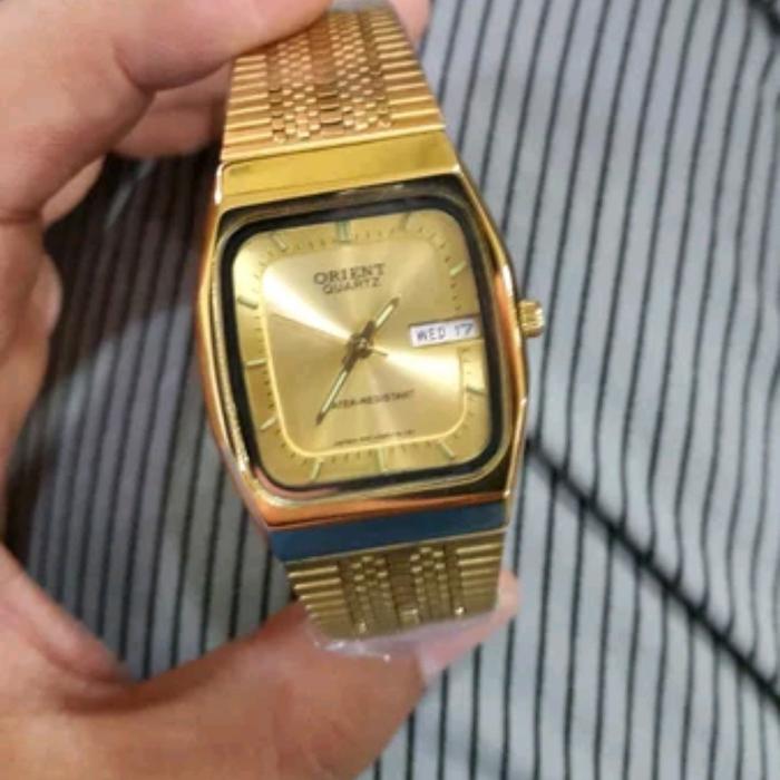 jam tangan orient quartz gold klasik ada tanggal dan hari jam vintagee