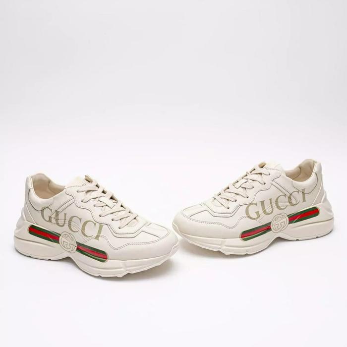 Gucci Men Rhyton Gucci Logo Leather Sneaker in Ivory