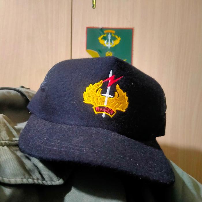 topi raider original