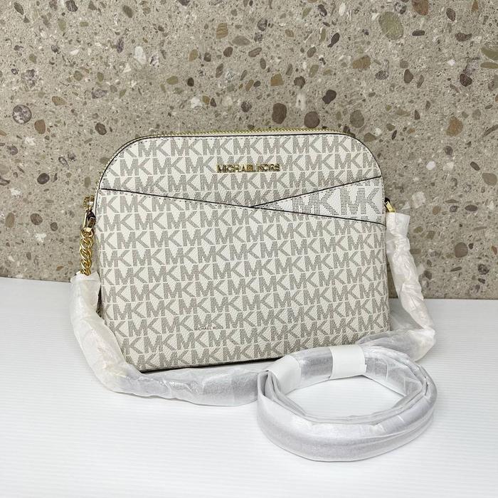 TAS MK JET SET TRAVEL MD DOME CROSSBODY SIGNATURE VANILLA