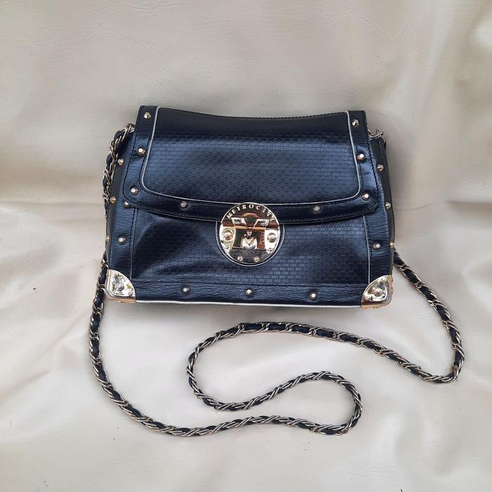 tas metrocity sling authentic