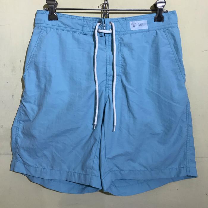 Celana pendek pria Uniqlo biru muda original second