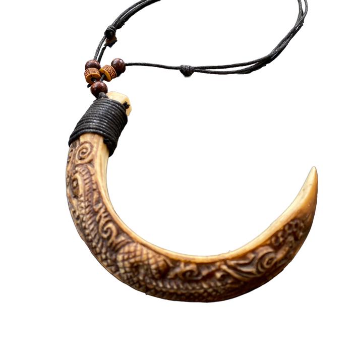 Kalung taring ukir 17cm ukiran khas dayak