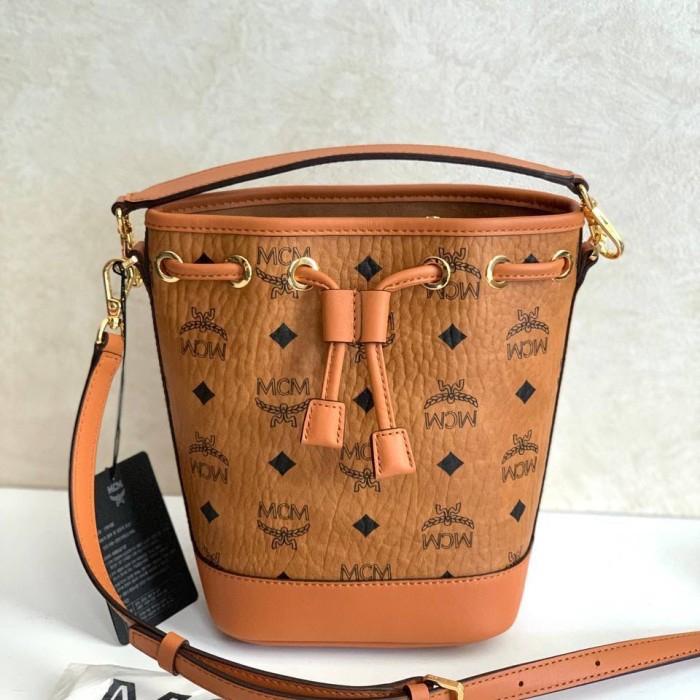 MCM Mini dessau visetos drawstring bag Cognac