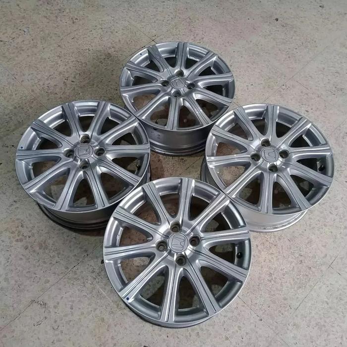 velg mobil bekas jazz mmc r16 pcd 4x100.