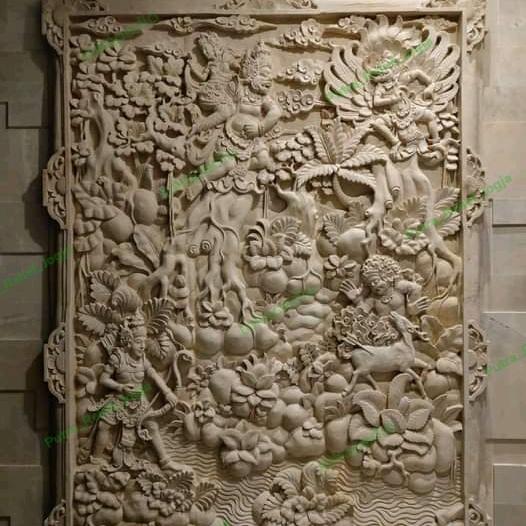 relif ukir batu alam motif pewayangan