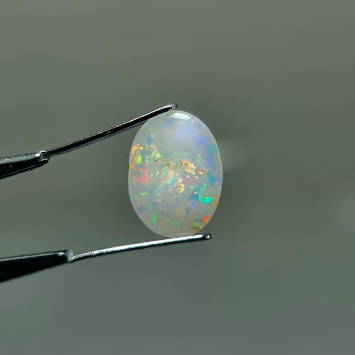 1.89ct Untreated White Opal Kalimaya Susu milky Banten playing color