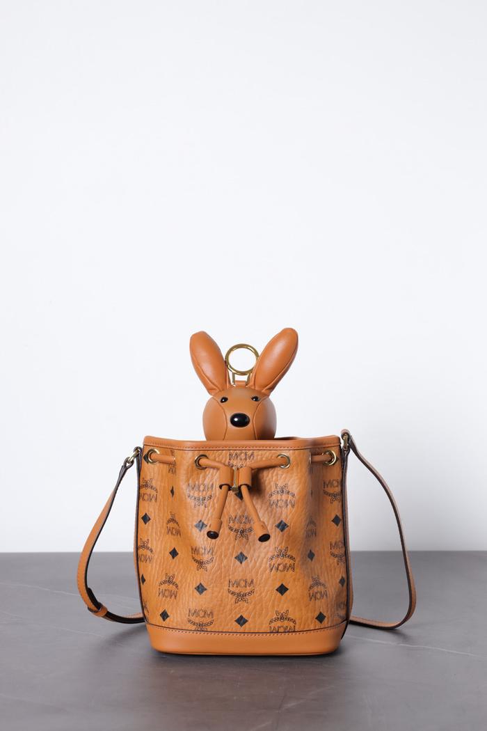 MCM Mini Rabbit Dessau Drawstring Bag in Cognac Visetos Leather