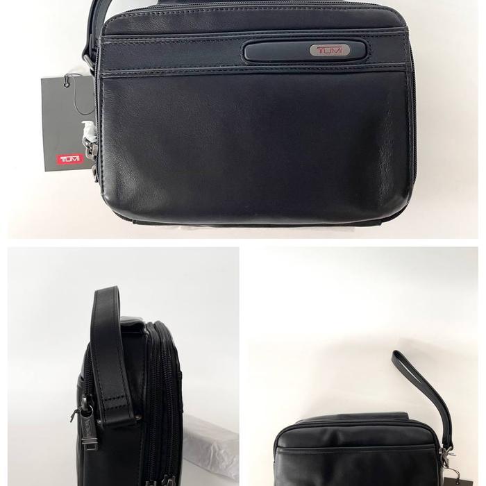 tumi business clutch tas