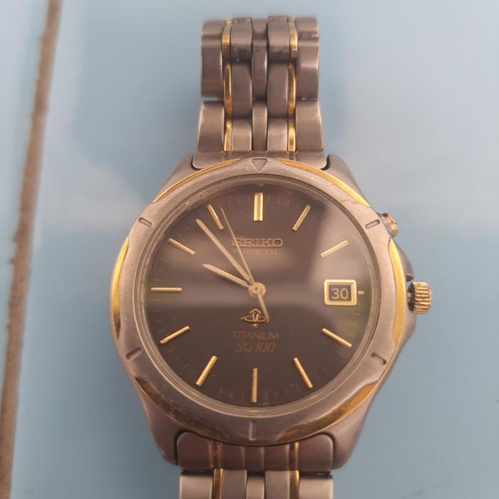 seiko kinetic titanium sq 100