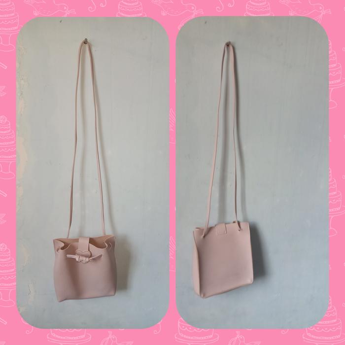 PRELOVED Tas Serut sling bahan kulit Jeruk warna pink