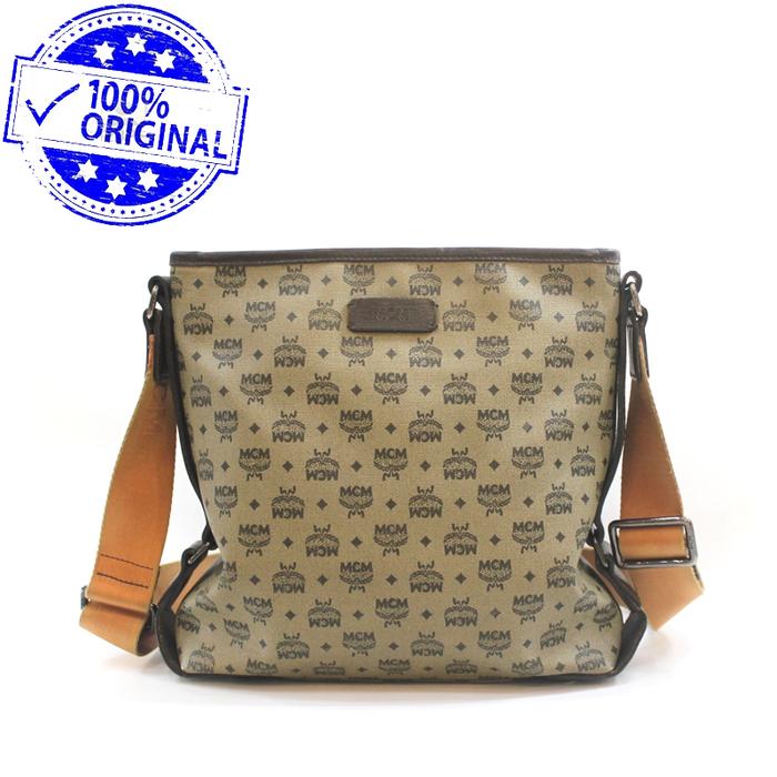 Preloved MCM Waterproof Canvas Messenger Sling Bag AUTHENTIC