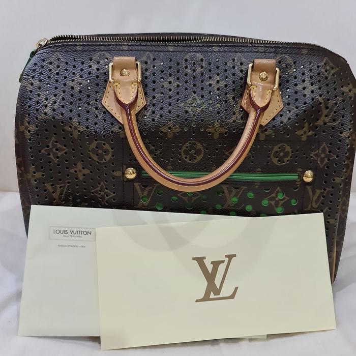 TAS LV SPEEDY MON PERFO V ORI PRELOVED ( M95181 )