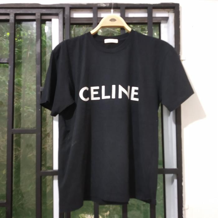 kaos celin hitam kid