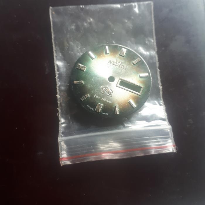 plat jam tangan nelson