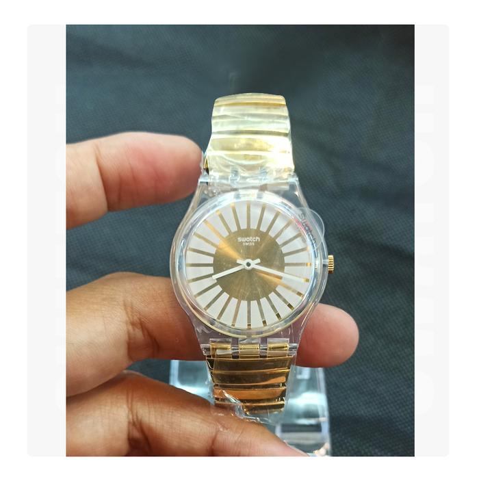 Jam Tangan SWATCH GE248B Rayon De Soleil Unisex Gold Original Resmi
