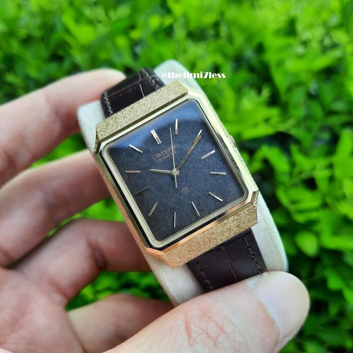Jam tangan Orient quartz GP tank gold plated dengan black snow dial made in japan ref IT 585938 - 40
