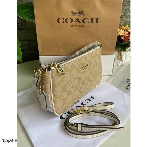 # Tas Wanita Coach Top Handle Pouch In Signature Canvas White