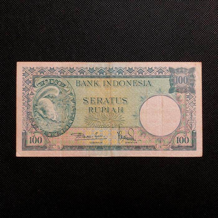 Uang Kuno 100 Rupiah Tupai Seri Hewan Tahun 1957 -F21