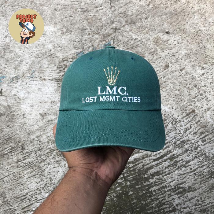 Topi LMC (Lost Management Cities) “Rolex Looklike Script” Baseball Cap