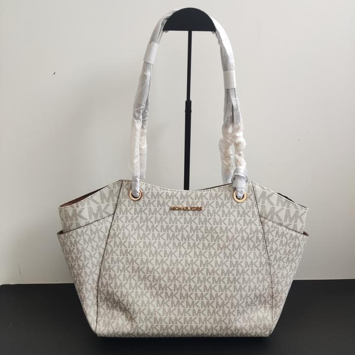 mk jet set travel large chain shoulder tote monogram vanilla