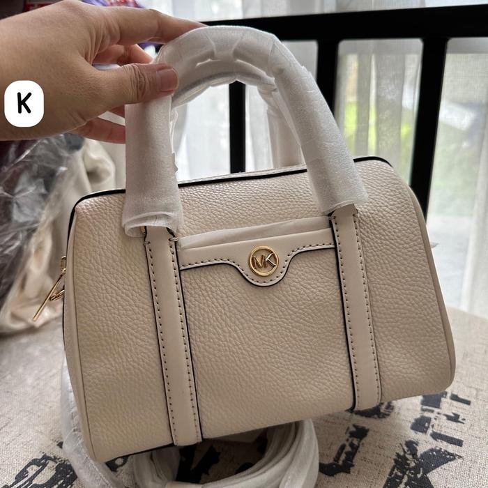 mk bag travel small duffle crossbody light cream
