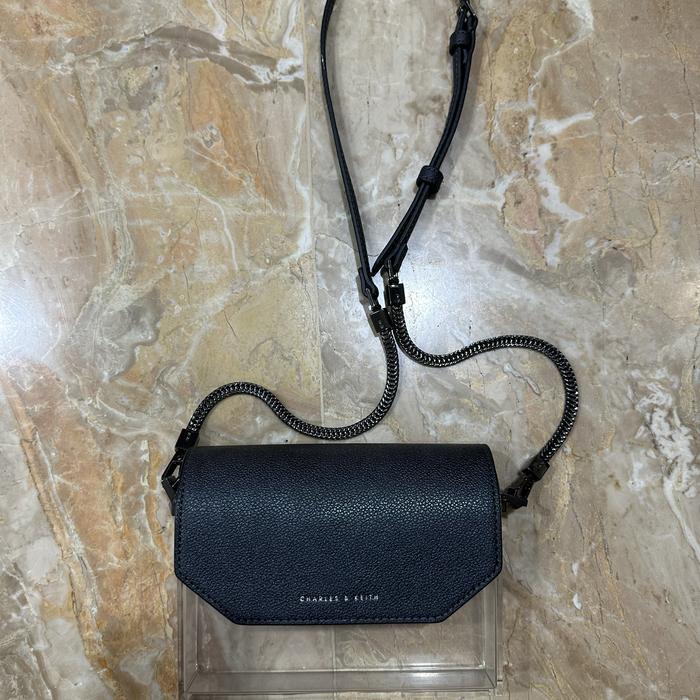 Charles and Keith Angular Front-Flap Clutch Transparent Tas Selempang