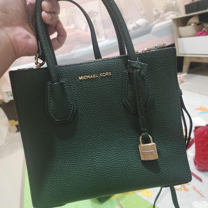 MK mercer small with longstrap