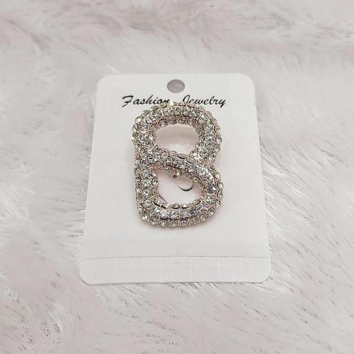 geraihijab_id BROS JILBAB MUTIARA MEWAH BUTTONSCARVES TITANIUM ANTI KARAT