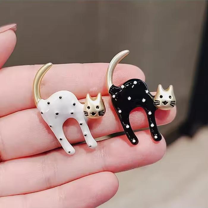 bros peniti kucing polkadot