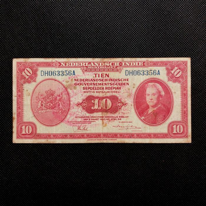 Uang Kuno 10 Gulden NICA Wilhelmina Tahun 1943 cap/stempel Pemberontakan RMS (Republik Maluku Selata