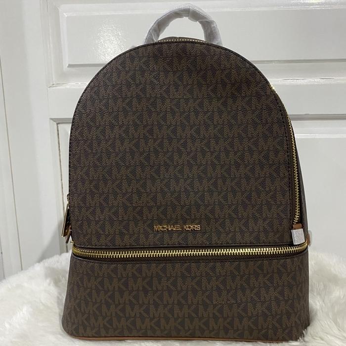 tas wanita mk rhea medium zip backpack brown in