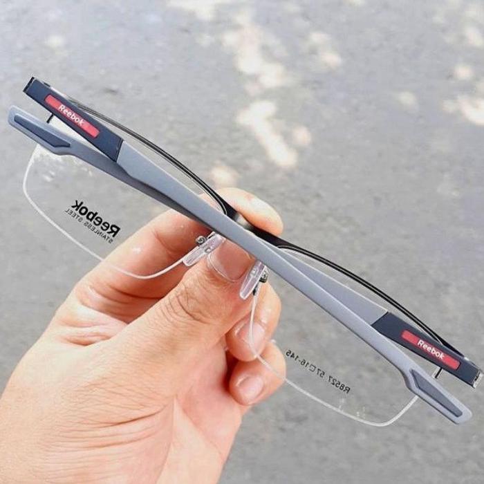 FRAME KACAMATA REEBOK PRIA TERLARIS R8527 SEMI RIMLESS STAINLESS STEEL TITANIUM