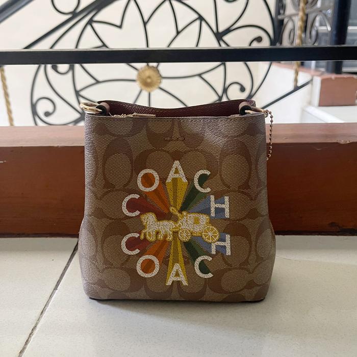 Preloved Coach C6835 Signature Radial Rainbow Mini Town Bucket Bag Khaki Multi