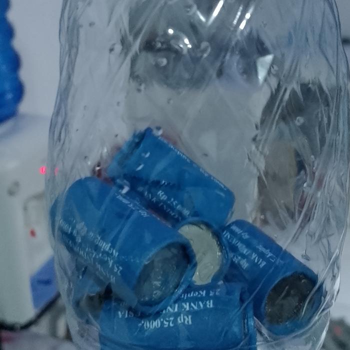 uang 1000 masih bersegel..