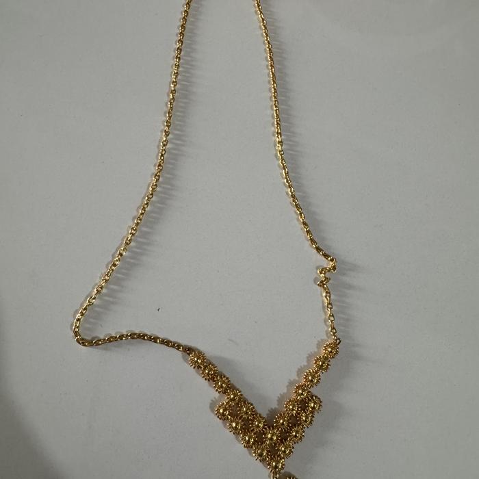Emas london kadar 99 persen
