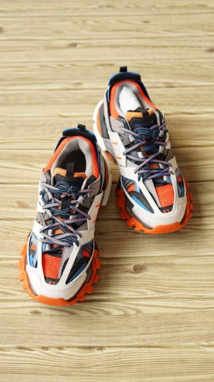 Balenciaga men track trainers in orange/white