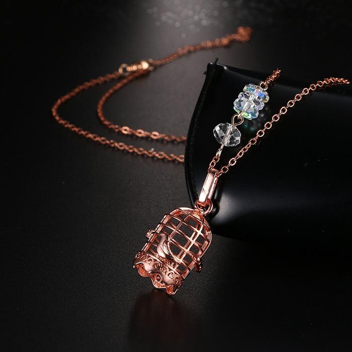 Ms Kalung Dengan Liontin Kristal Bentuk Sangkar Burung Kecil