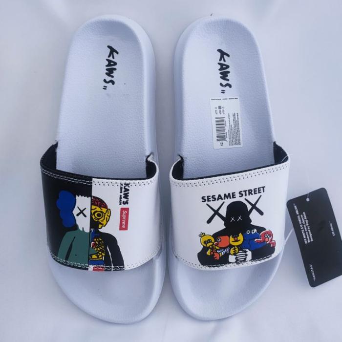 PROMO!! SANDAL SLOP KAWS PRIA WANITA / SANDAL SLIDE KAWS COWOK CEWEK