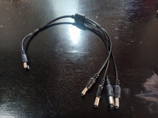 male to male dc kabel cabang 4 cumi gurita way splitter power adaptor charger solar Jack 2.1mm 2.5mm